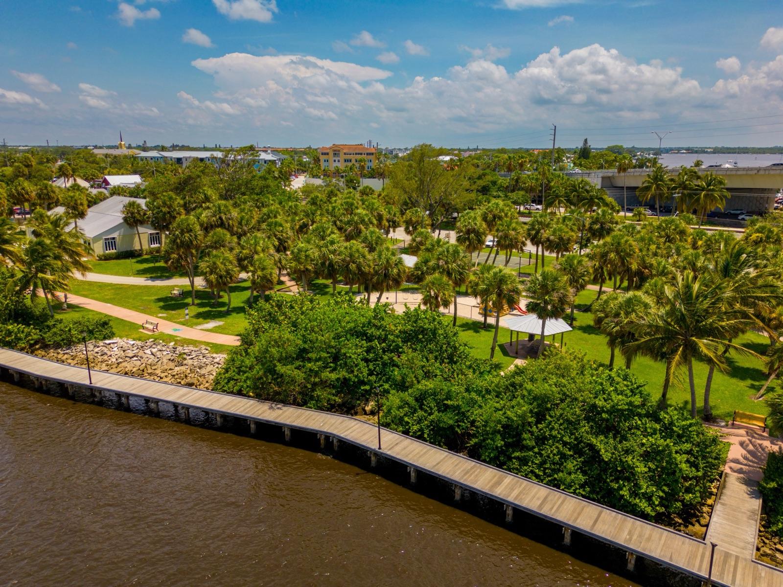 Palm-lined riverwalk along the St. Lucie River in Stuart, Florida